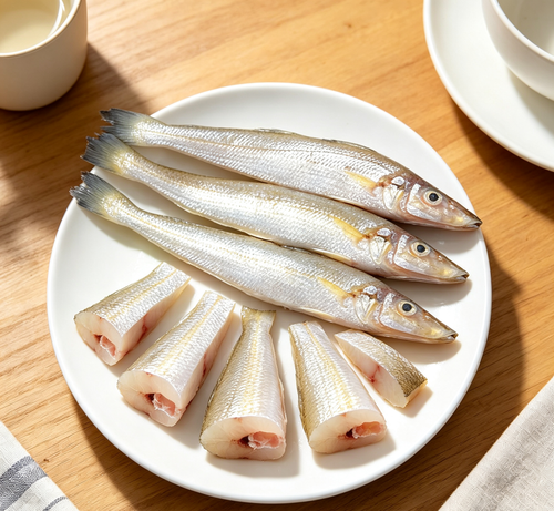 Fresh whole sea fish with silver scales